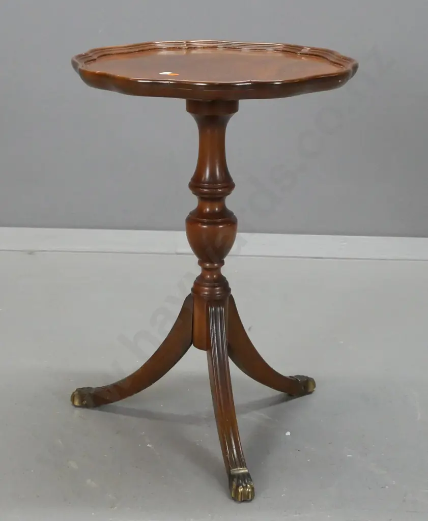 small reproduction wine table - walnut veneer top with shaped edge, beech base with brass paw feet - one loose leg, some Image 1++