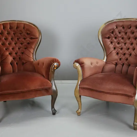 pair of reproduction Victorian style cab-leg armchairs with brown velvet upholstery, deep button back - fading to finish