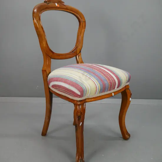 Victorian walnut balloon back chair, reupholstered in multi-colour stripe fabric, with repairs to back, replaced carved