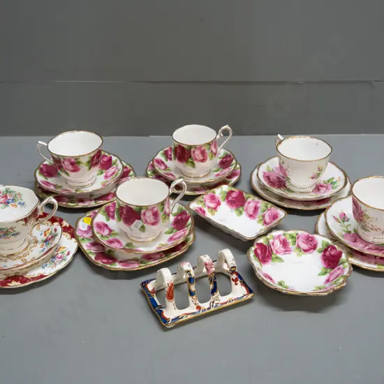 Masons Mandalay toast rack, 6x Royal Albert trios: 2x American Beauty, 3x Old Country Rose, 1x Canterbury.