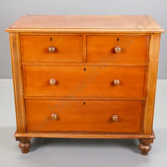 New Zealand colonial kauri 4-drawer chest with turned wooden knobs, inlaid cedar stringing to top, sides and drawers, on
