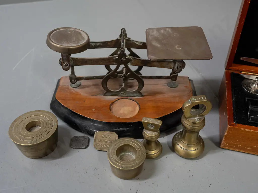 small postal style balance scales with assorted brass weights and a cased set of chrome weights - brass bucket weights Image 1++