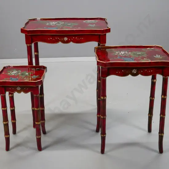set of 3 Chinese nesting tables with shaped scrolling tops, faux bamboo legs, red painted finish with hand painted