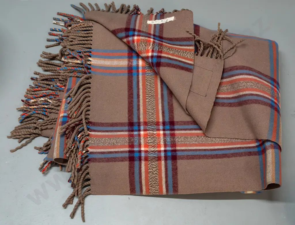 woollen travel rug with Kaiapoi Woollen Christchurch Maori chief label - some fading and spots of staining Image 1++