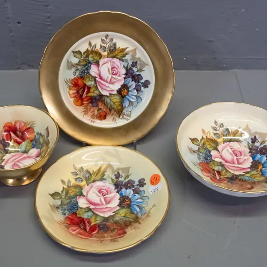 Aynsley floral and gilt hand-painted trio and small comport, all signed L.A. Bailey - comport dish is H-50 D-140