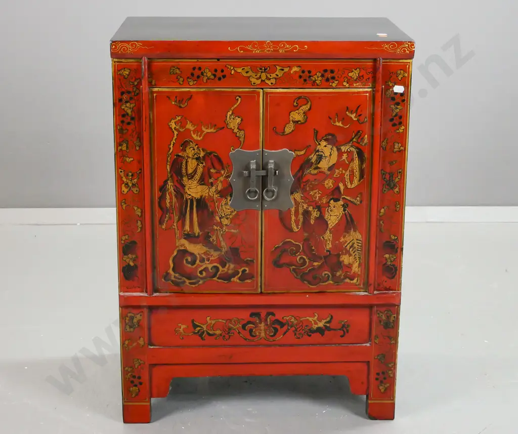 small Chinese 2-door black and red cupboard, front decorated w/ polychrome figural, bat and moth motifs, brass catch Image 1++