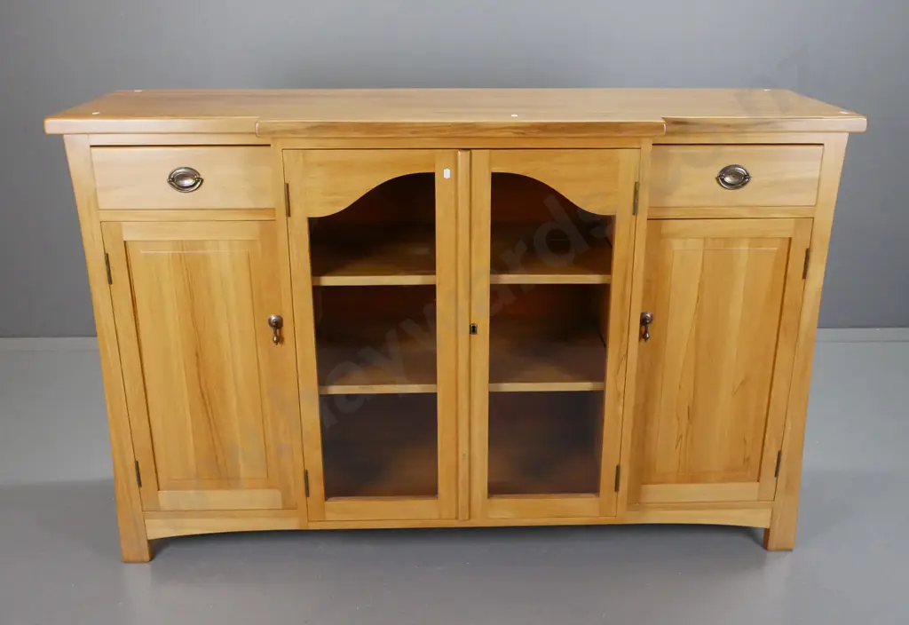 reproduction rimu break-front sideboard with 2 shaped glazed doors, one solid door, 2 interior shelves, 2 drawers, metal Image 1++