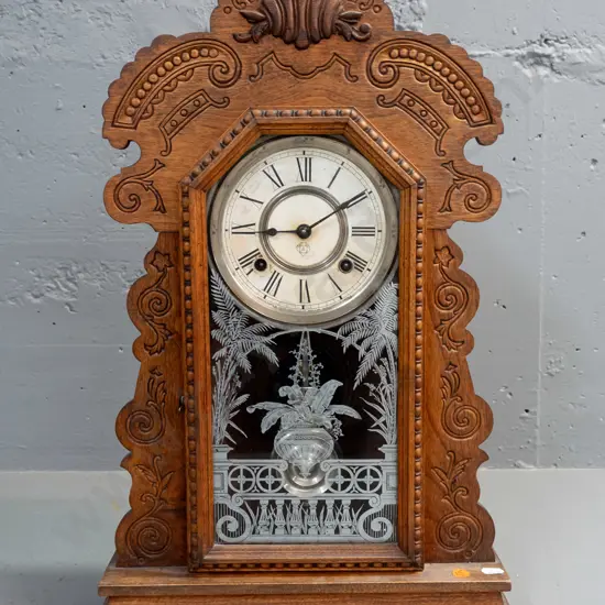 Ansonia USA mantel clock in carved & decorated walnut cased with etched glass in door - has old J. McNab Timaru label on
