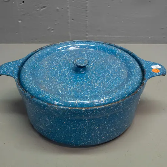 blue speckled enamel heavy lidded casserole - marked "radiation nz" on base - some stains, wear and chips H-110 W-320