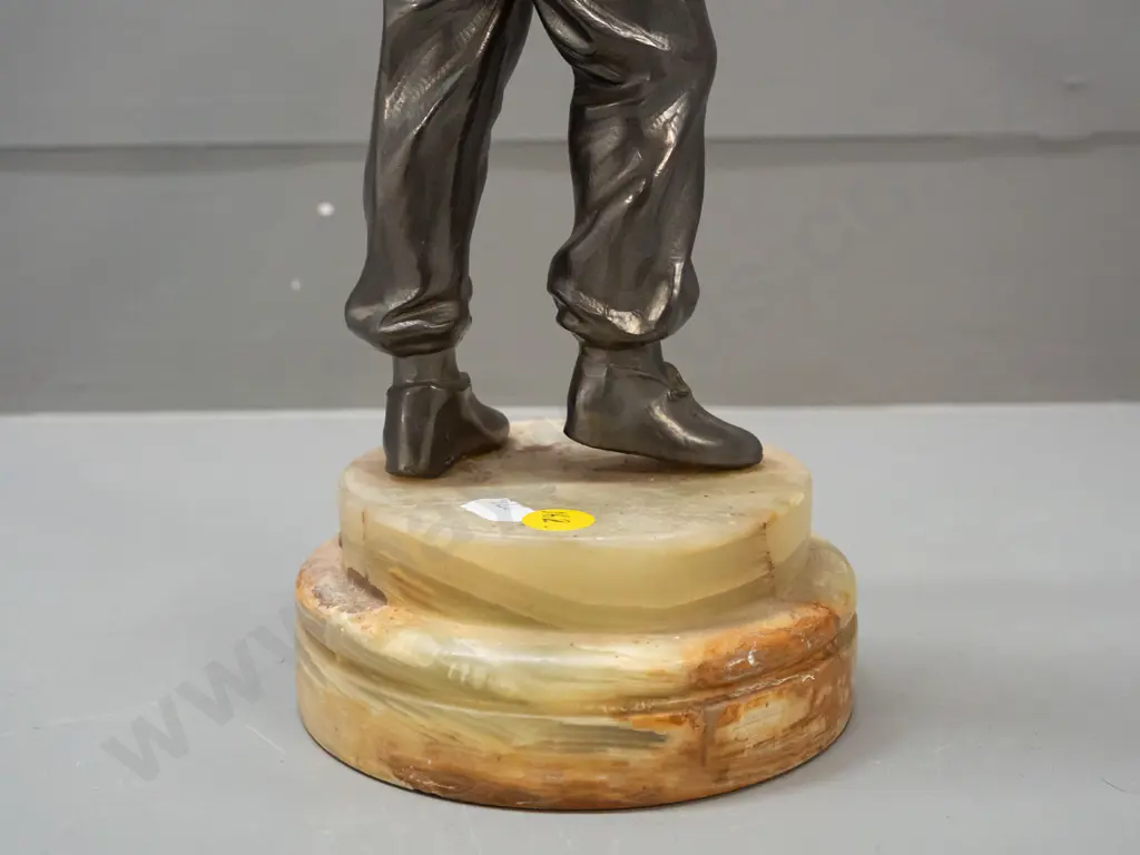 cast metal figure on composite stone base, farmer sharpening scythe. H-320 Image 1++