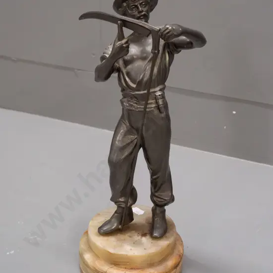 cast metal figure on composite stone base, farmer sharpening scythe. H-320