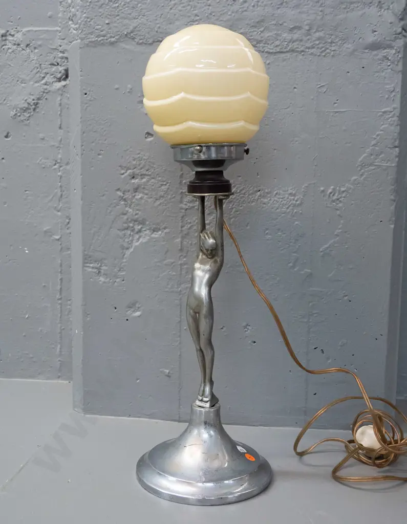 art deco style figural table lamp base  - cast metal female figure, chrome base and journal, stepped ivory coloured Image 1++