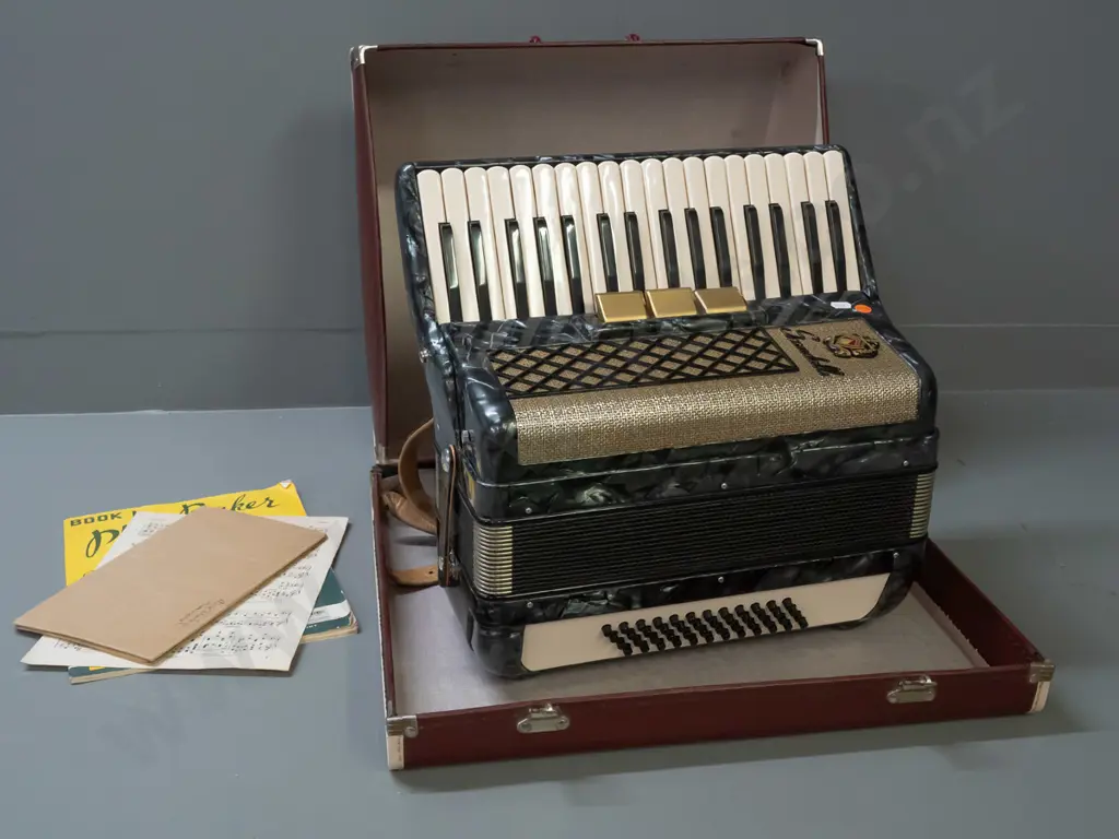Scandalli piano accordion with case and booklets - some wear to case Image 1++