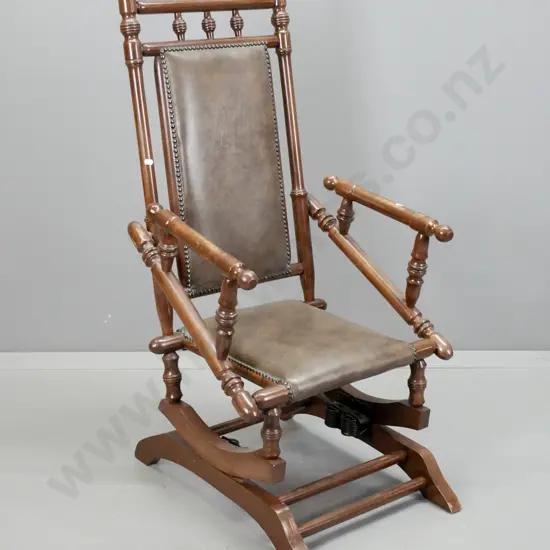 vintage beech Dexter chair, re-covered in vinyl with brass studding, some scratching, wear to arms H-110 W-560 D-640