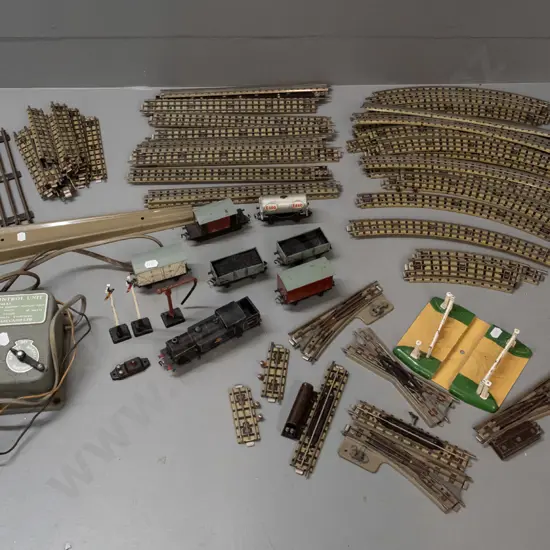 vintage Meccano / Hornby Dublo train set with transformer, locomotive and rolling stock, assorted track pieces, level