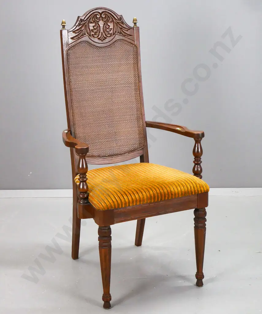 vintage oak and elm open-arm chair with tight-weave cane back, carved foliate decoration, brass finials, turned & Image 1++
