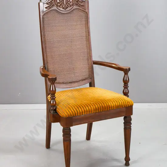 vintage oak and elm open-arm chair with tight-weave cane back, carved foliate decoration, brass finials, turned &