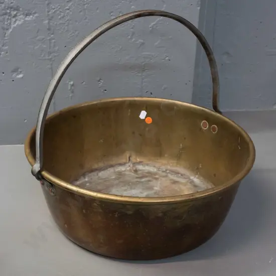 brass jam pan with fixed cast metal handle - has repaired split and dents to bottom H-350 D-390