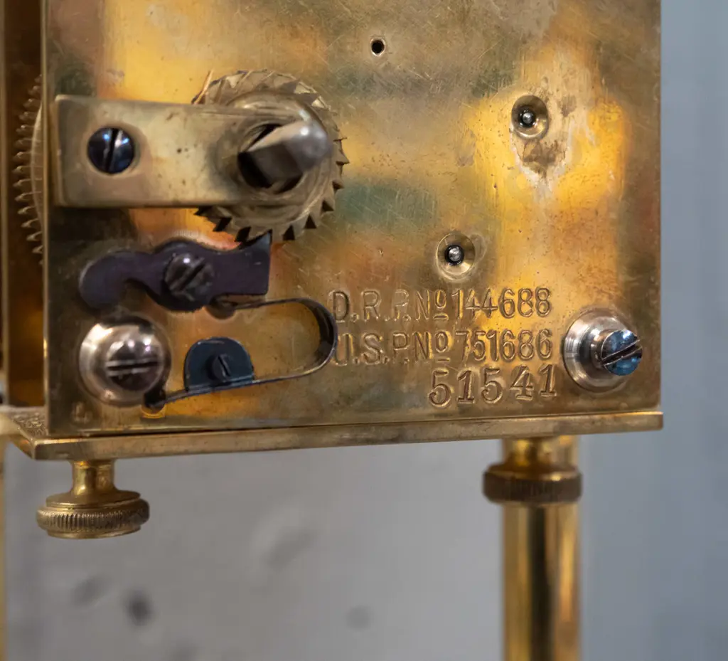 arts nouveau style glass cased mantel clock - loose waisted dome top has cut whiplash and gilt decoration, silver dial Image 1++