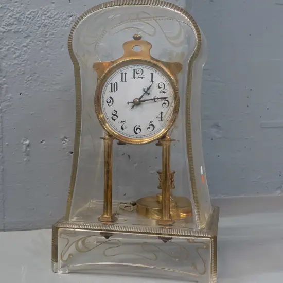 arts nouveau style glass cased mantel clock - loose waisted dome top has cut whiplash and gilt decoration, silver dial