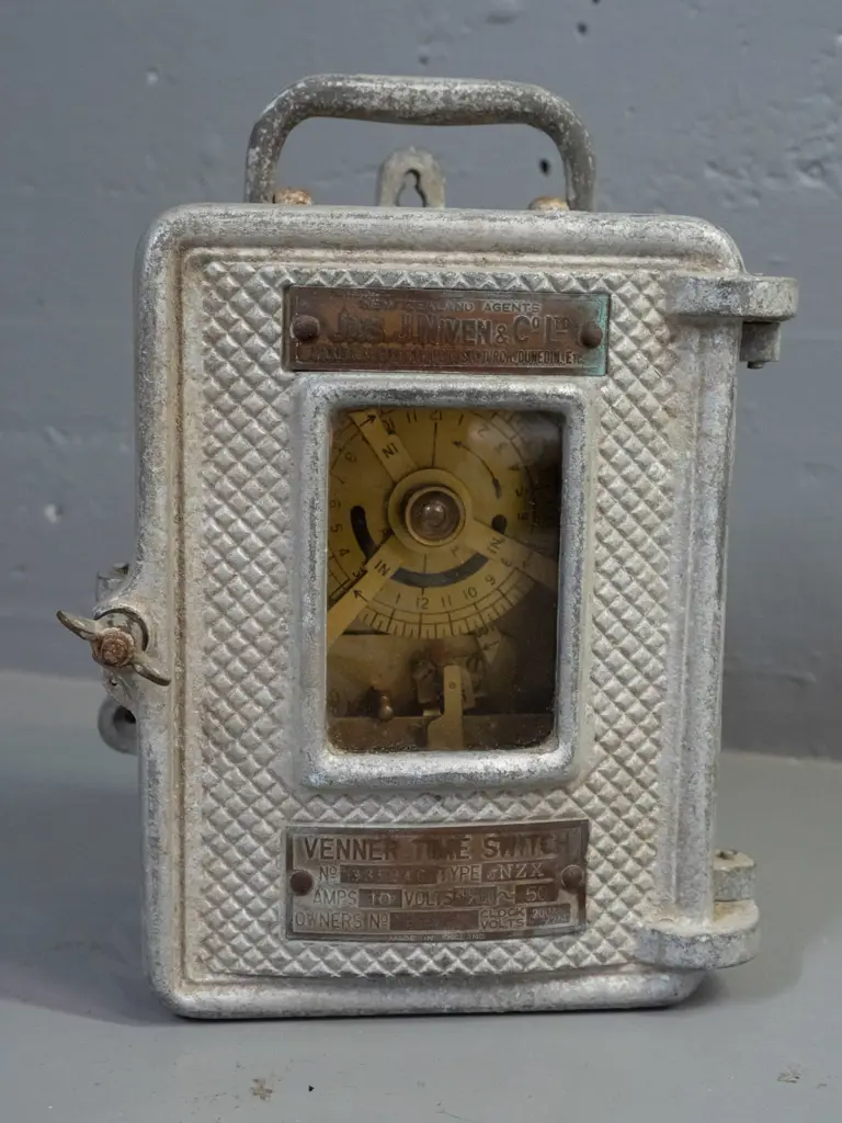 Venner time switch - brass mechanism in cast alloy housing - "Auckland, Wellington, Christchurch, Dunedin, Etc." Image 1++