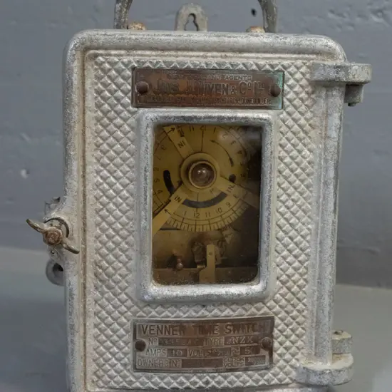 Venner time switch - brass mechanism in cast alloy housing - "Auckland, Wellington, Christchurch, Dunedin, Etc."