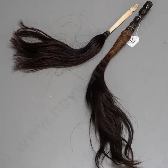 2 African fly whisks - one with carved wood handle, beads, cord binding and animal hair L-500, other with carved bone &