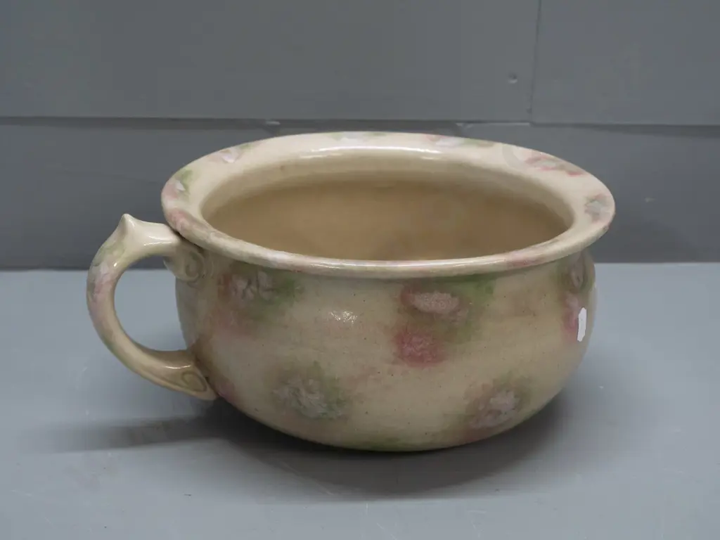 stoneware chamber pot with smudged Timaru potteries mark, sponged glaze, small chip to bottom rim H-130 W-270 at handle Image 1++