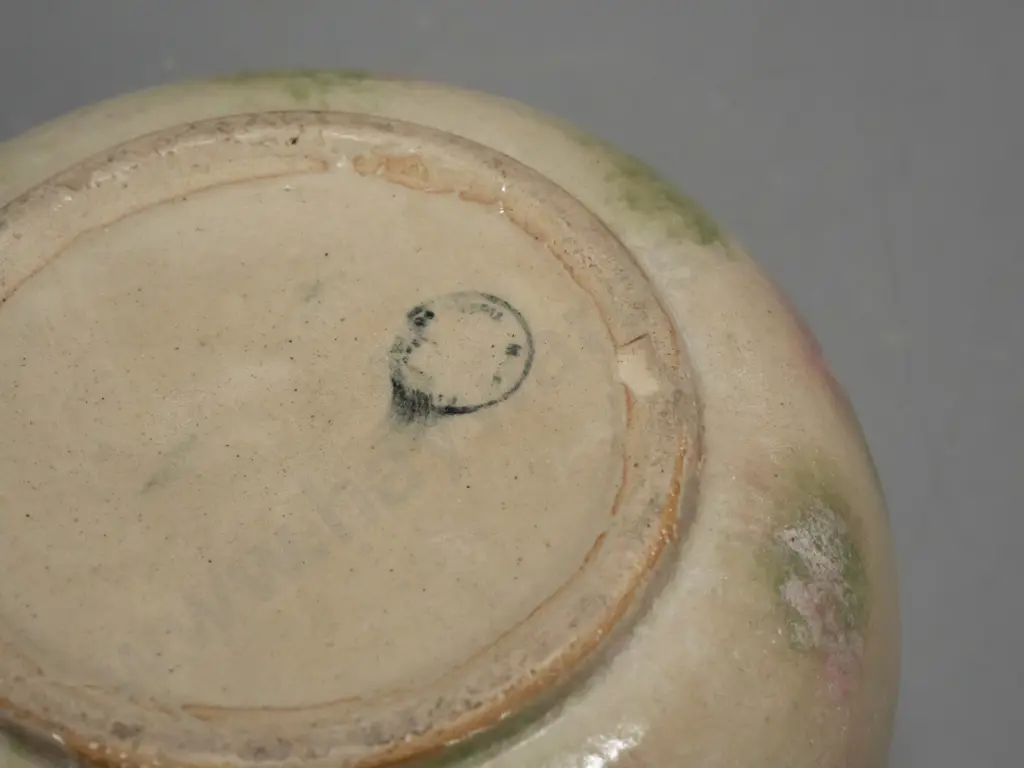 stoneware chamber pot with smudged Timaru potteries mark, sponged glaze, small chip to bottom rim H-130 W-270 at handle Image 1++