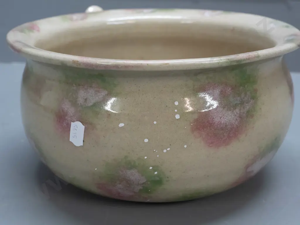 stoneware chamber pot with smudged Timaru potteries mark, sponged glaze, small chip to bottom rim H-130 W-270 at handle Image 1++