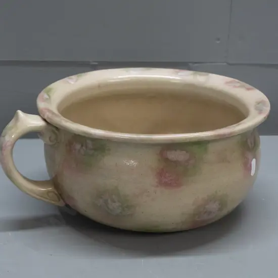 stoneware chamber pot with smudged Timaru potteries mark, sponged glaze, small chip to bottom rim H-130 W-270 at handle