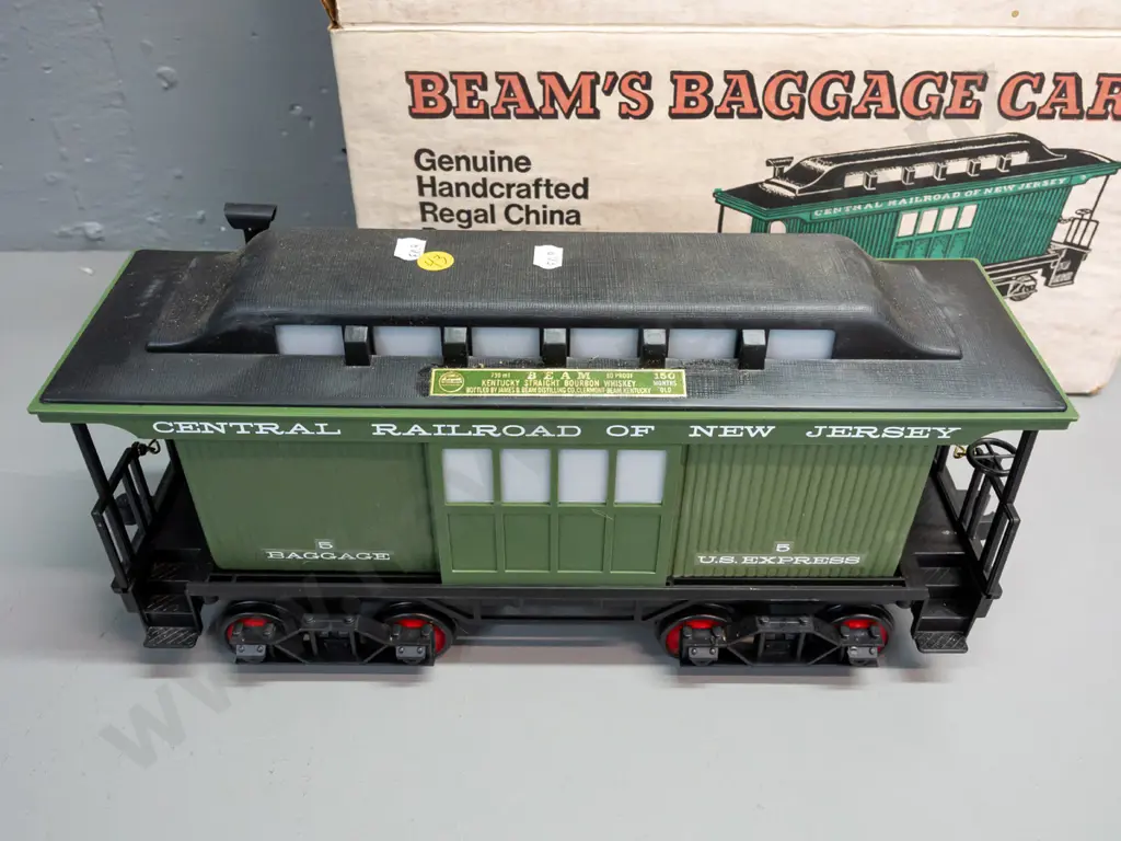 5-piece Jim Beam railway decanter set: Locomotive and 4 cars with New Jersey Central Railroad markings, all sealed with Image 1++
