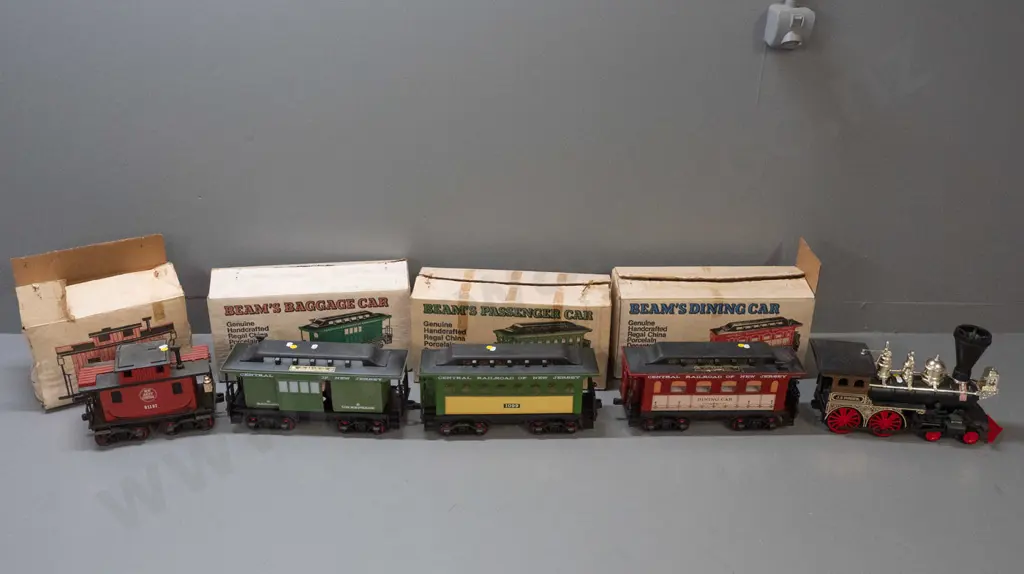 5-piece Jim Beam railway decanter set: Locomotive and 4 cars with New Jersey Central Railroad markings, all sealed with Image 1++