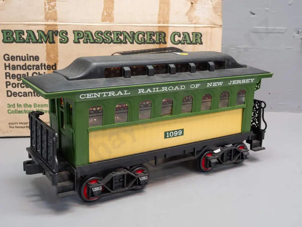 5-piece Jim Beam railway decanter set: Locomotive and 4 cars with New Jersey Central Railroad markings, all sealed with Image 1++