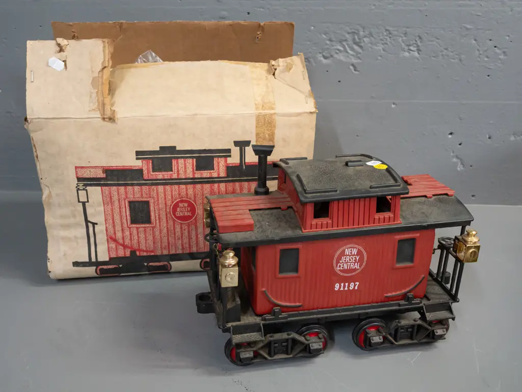 5-piece Jim Beam railway decanter set: Locomotive and 4 cars with New Jersey Central Railroad markings, all sealed with Image 1++