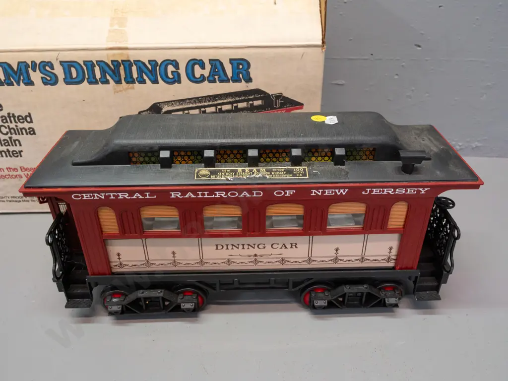 5-piece Jim Beam railway decanter set: Locomotive and 4 cars with New Jersey Central Railroad markings, all sealed with Image 1++
