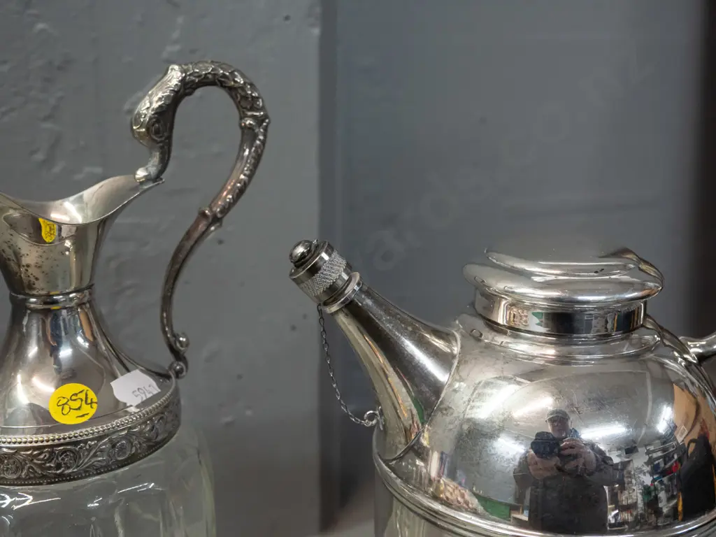 Italian glass and silver plated claret jug H-310 and a plated hot water jug with stoppered spout. Claret jug missing Image 1++