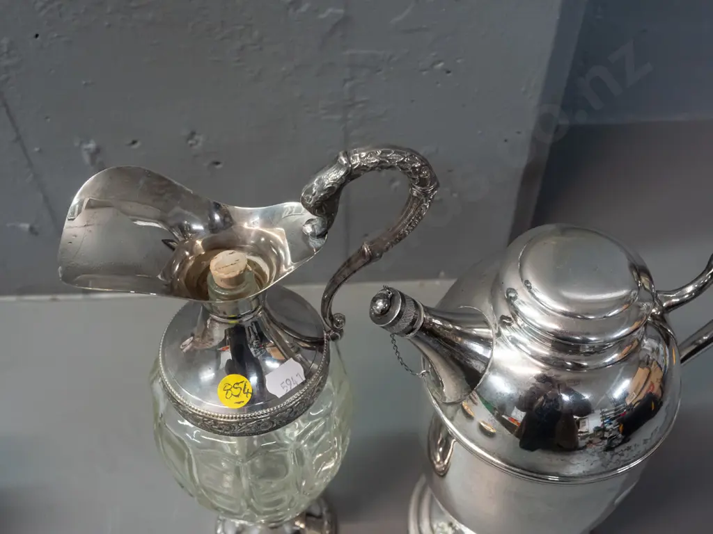 Italian glass and silver plated claret jug H-310 and a plated hot water jug with stoppered spout. Claret jug missing Image 1++