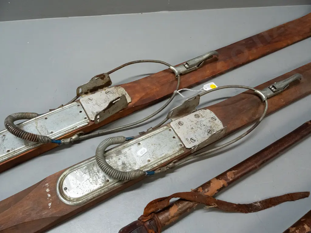 pair of vintage alpine skis, timber w/ metal edging & SkiRite Toronto/Willi Walch Austria bindings. Decal reads Image 1++