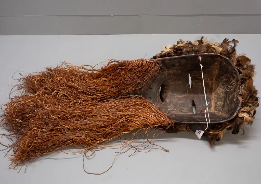African carved wood mask with fibre and feather decoration & metal bell. Chokwe, Democratic Republic of Congo H-820 Image 1++