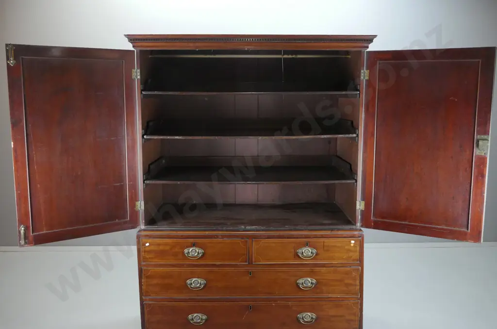 late Georgian mahogany linen press with 2 panelled doors, 3 sliding shelves, 4oak-lined drawers, on bracket feet, box- Image 1++