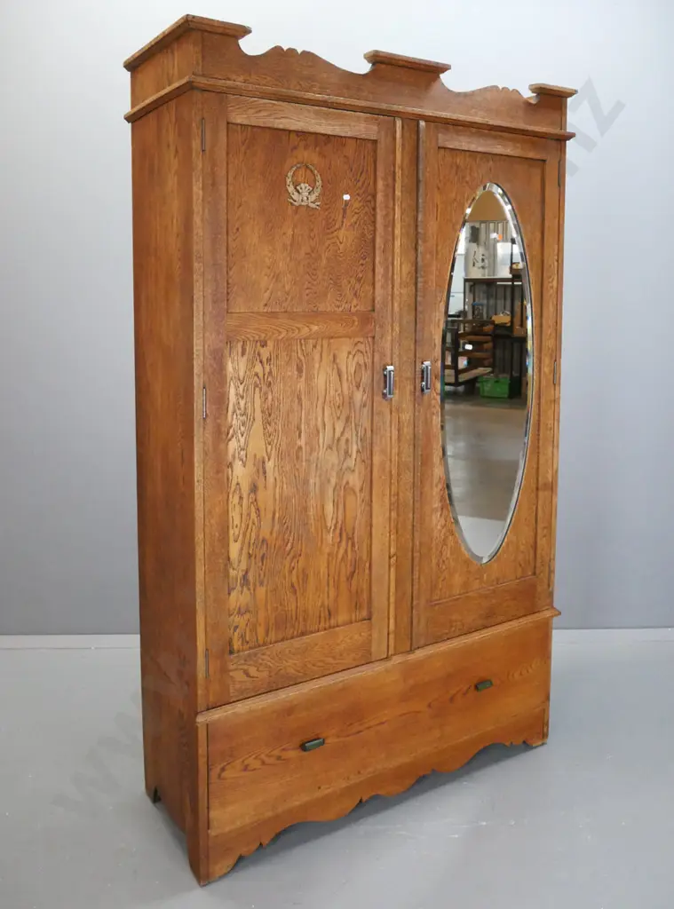 art deco oak double-door wardrobe, one panelled door & one with bevelled edge oval mirror, boot drawer. Locks removed Image 1++