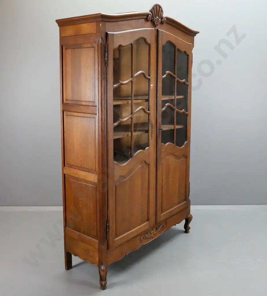 French oak 2-door cupboard with 2 astragal glazed doors, shaped door panels, and short cab legs, carved decoration and Image 1++