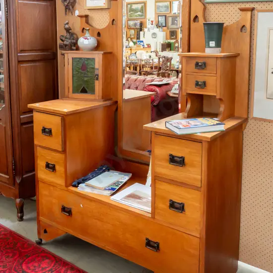 art nouveau oak dresser with full sized bevelled egde dressing mirror, flanked by leadlight cupboard and
