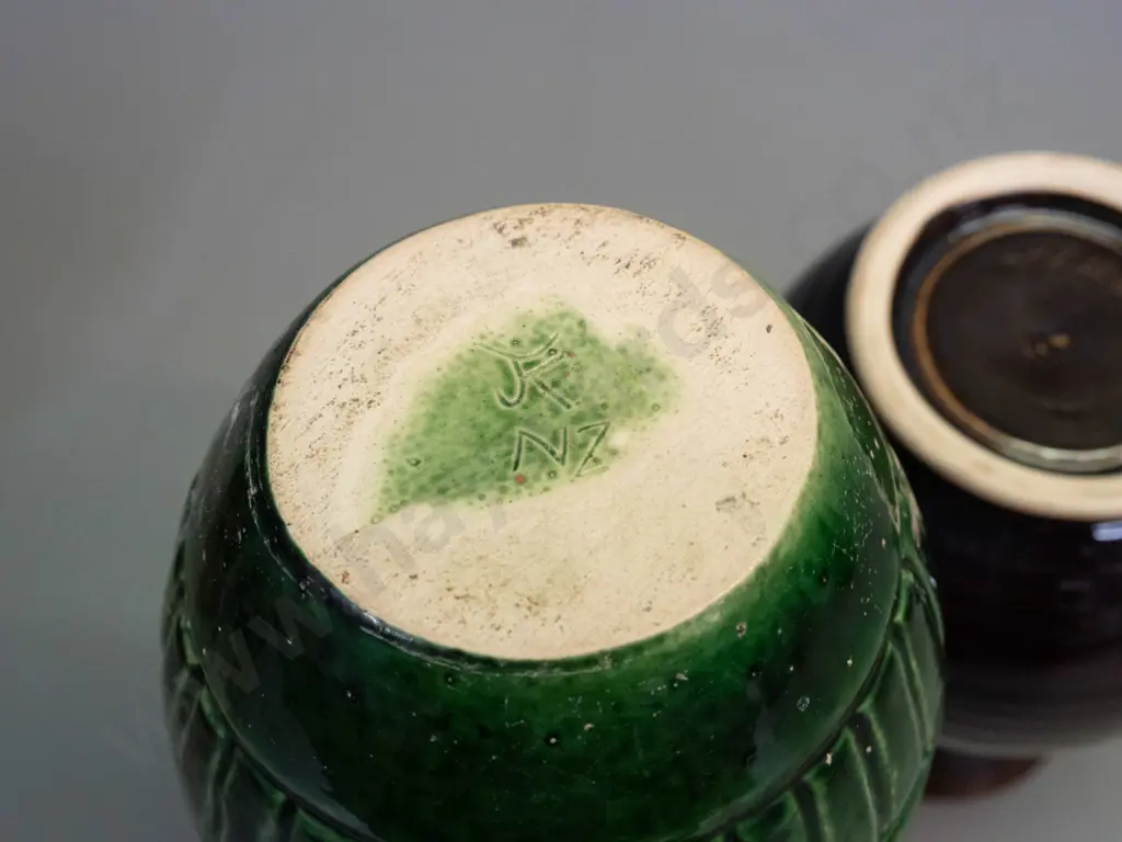 2 pieces of New Zealand studio pottery - green glazed geometric pattern vase - unknown mark (JF or JK?) with some glaze Image 1++