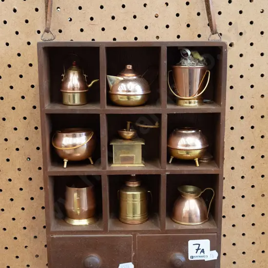 wall mounted display shelves with copper and brass miniatures H300