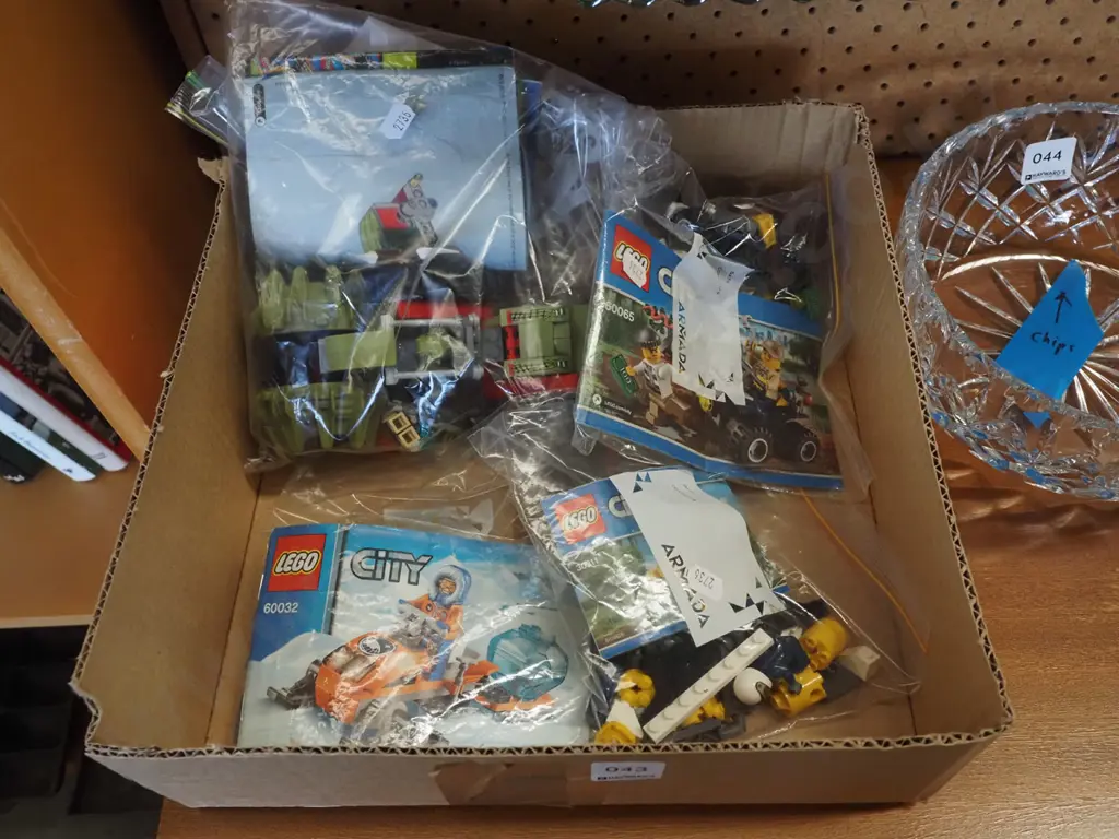 box of Lego sets Image 1++