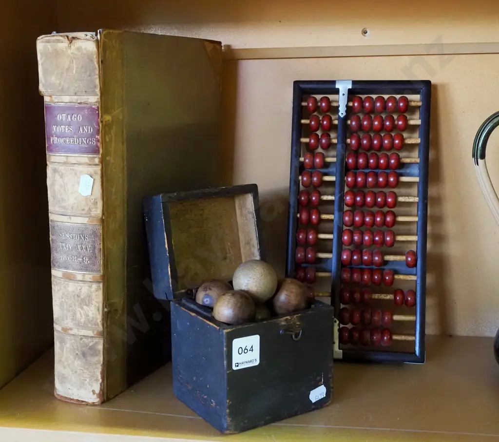 vintage leather bound book, abacus, wooden petanque style game Image 1++