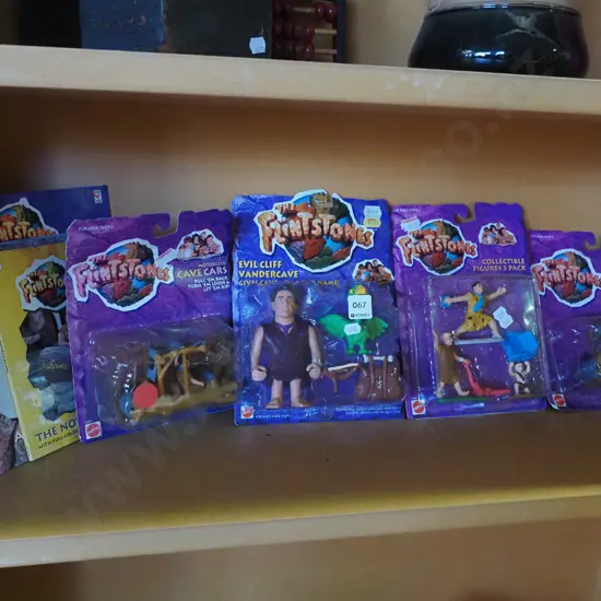boxed as new Flintstone movie figurines and books