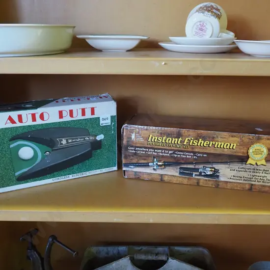 boxed golf auto putt machine, boxed instant fisherman portable fishing kit